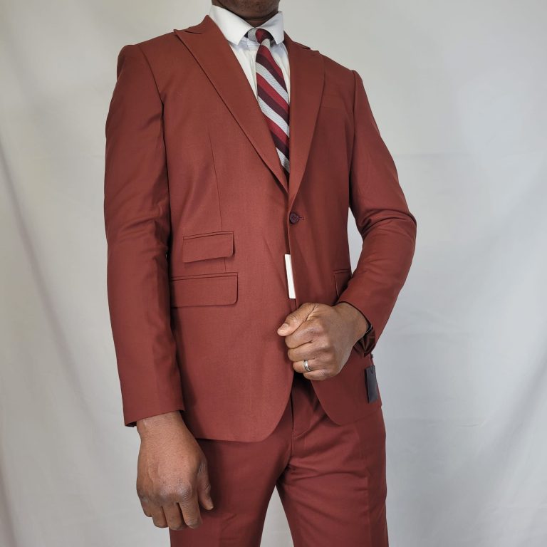 Man wearing a stylish light brown suit with a striped tie – premium fashion by JEVGLAM, Canada-wide delivery